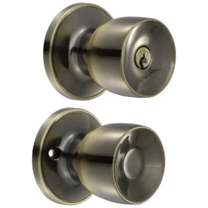 Pomo cilíndrico media copa función entrada, latón antiguo, llave estándar, blíster